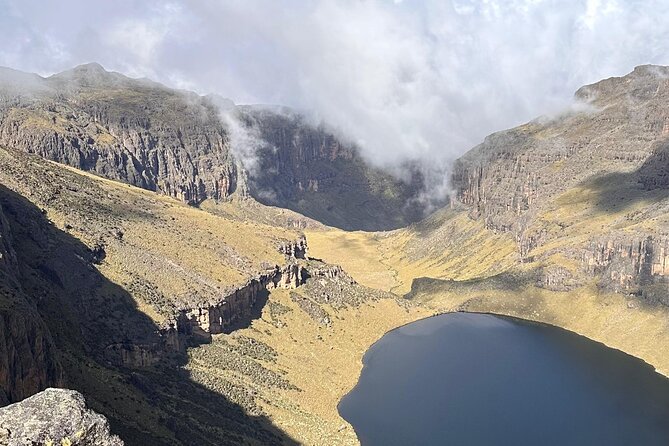 4 Day Mount Kenya Trek Up Chogoria Down Sirimon - Day 1: Chogoria Banda to Lake Ellis, Forest, Tussock, and Nithi Falls