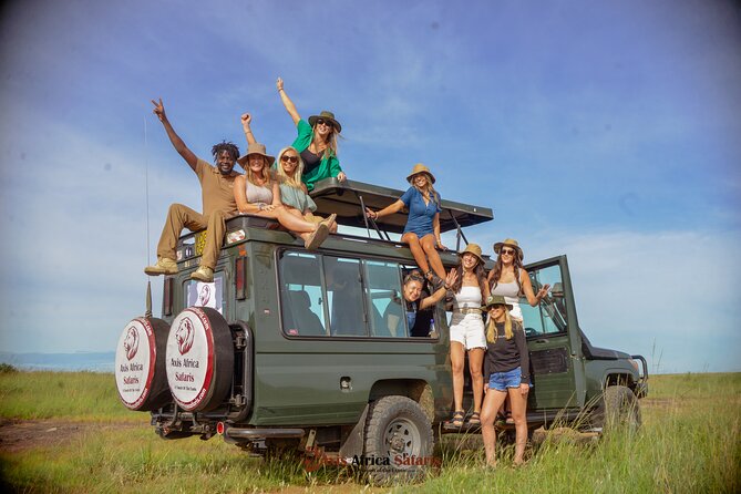 4 Days Safari Adventure Masai Mara and Nakuru Park Group - Day 1 in Masai Mara: Rift Valley viewpoint, Narok route, and a sunset drive