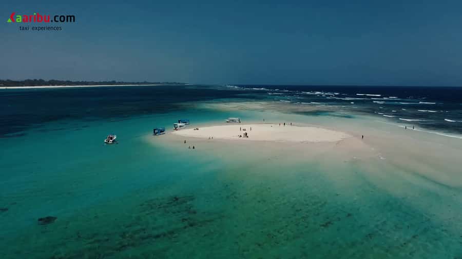 Diani Beach: Glass-Bottom Boat Cruise to Robinson Island - Snorkeling and guided swimming, even if you are not a strong swimmer