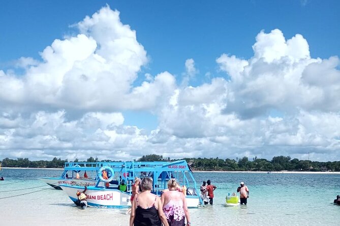 Diani Beach: Glass-bottom Boat Ride with Underwater Show - The sandbank stop: 45 minutes of water time and choices