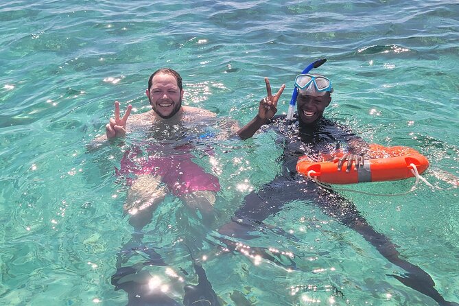 Full Day Dolphin Watching with Snorkeling in Wasini - Guides like Omar and Hussein: why the experience feels smooth