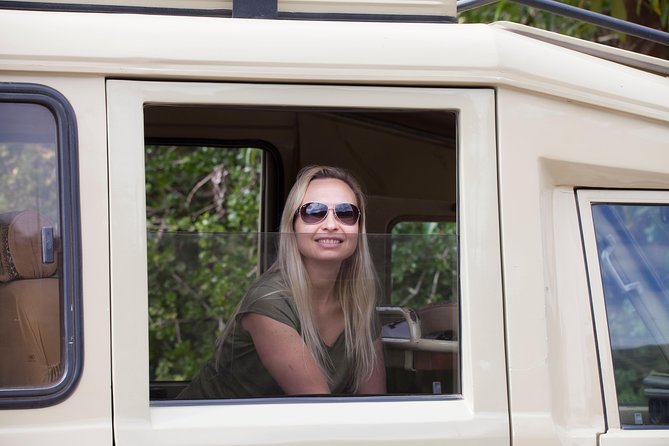 Introducing Kenya Safari Package - Amboseli National Park: elephants close up, with Kilimanjaro framing the day