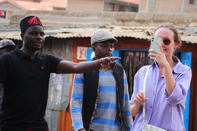 Kevins Kibera Slum Tours - Stop One in Kibera: Bone Craft, Education Spaces, and a Family Home
