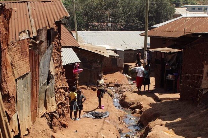 Kibera Chocolate City Tour - Toi Market: where work happens in plain sight