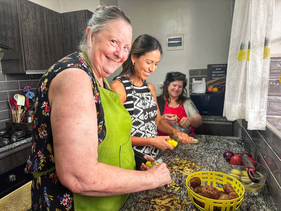 Local Market Tour and Traditional Meal Cooking Class - Going up to the fourth-floor kitchen, stairs and views included