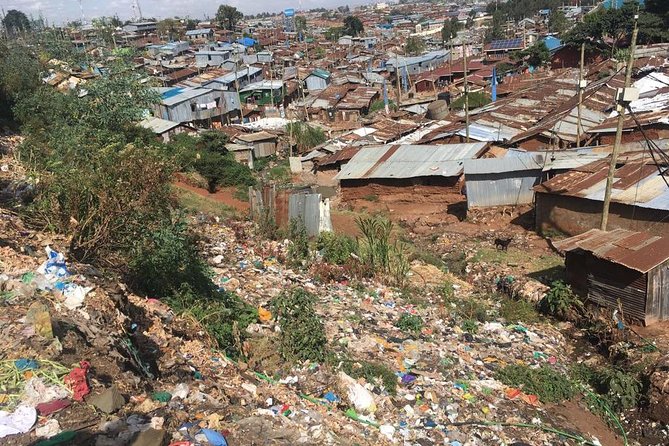Memorable Daily KIBERA Slums/Toi Market Tour with Locals (2 hours) - NGO projects, housing, education, and health in plain terms
