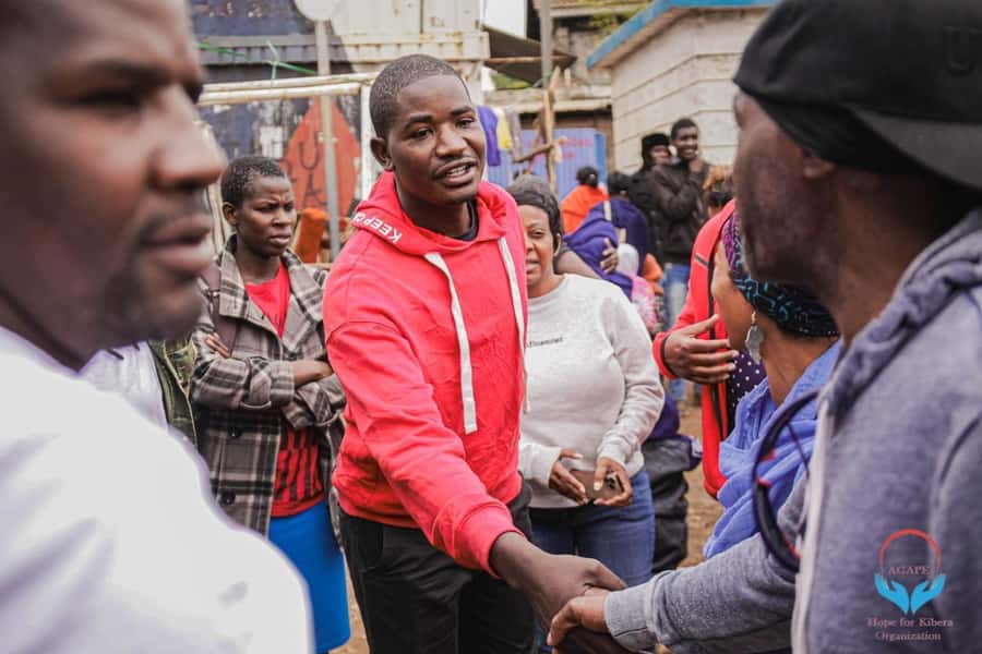 Nairobi: Chocolate City Kibera Slum Walking Tour - Kibera walking, photo stops, and how a short bus segment can help