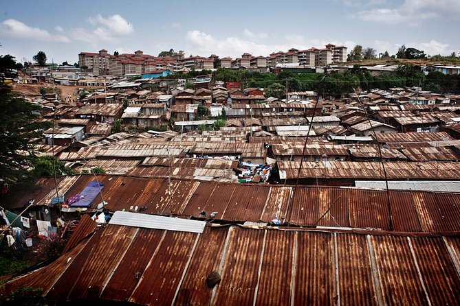 Nairobi Guided Tour to Kibera Slums - Walking into a typical Kibera house