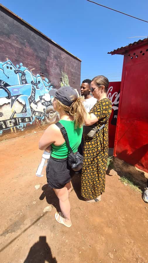 Nairobi: Kibera Street Art Tour with Local Artists - Where It Starts: Gateway Supermarket and the Walk Into Kibera